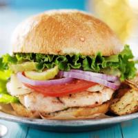 Grilled Chicken Sandwich · Charcoal grilled free range chicken served on a potato bun with lettuce, tomato, pickles and...