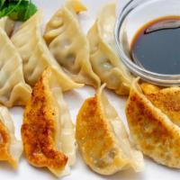 Pork Gyoza (6) · Pan fried pork dumplings.