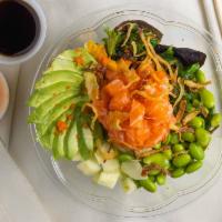 Alaska Poke · Spicy. Salmon, avocado, cucumber, mango, edamame, seaweed salad, onion flake, masago with sp...