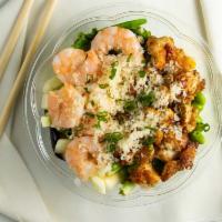 Surf & Turf · Spicy. Chicken, shrimp, cucumber, edamame, sweet corn, seaweed salad, tempura flake, green o...