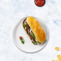 Philly Cheesesteak · Thinly cut steak, onions, peppers, and American cheese. Served on your choice of bread.