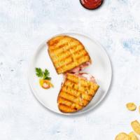 Delightful Panini · Honey glazed turkey, jarlsberg cheese, coleslaw, and honey mustard on toasted bread.