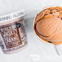 Dark Chocolate Whiskey Salted Caramel Ice Cream · Dark chocolate whiskey ice cream with salted caramel infused with whiskey. up to 5% abv. mus...