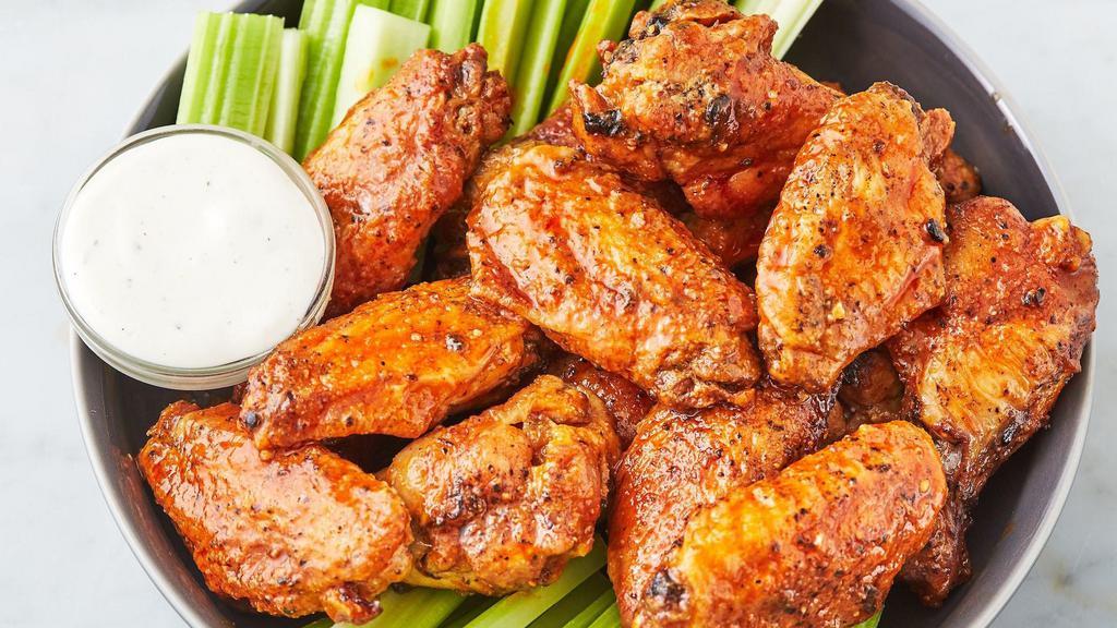 Wings · A basket of crispy wings w/ your choice of any sauce: Hennessy, Honey Garlic, Garlic Parmesan, Sweet Chili, Thai, Buffalo, Buffalo Lemon Pepper, Dry Lemon Pepper, BBQ, BBQ Jerk and served with ranch or blue cheese dressing.
