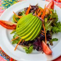 Avocado Salad · With romaine lettuce, avocado, tomatoes, red onions, carrots, peppers, and radishes. Vinaigr...