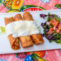 Enchilada Mi Bandera · Three corn tortillas stuffed with chicken, cheese, and shrimp. Topped with three salsas (mol...