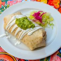 Veggie Special Burrito · Spinach, mushrooms and black beans. Stuffed with rice, beans, guacamole, sour cream, pico de...