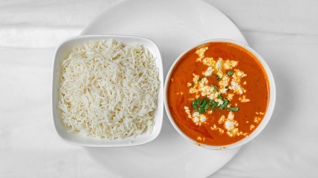 Paneer Makhani · Cubes of cheese cooked in a curry sauce.