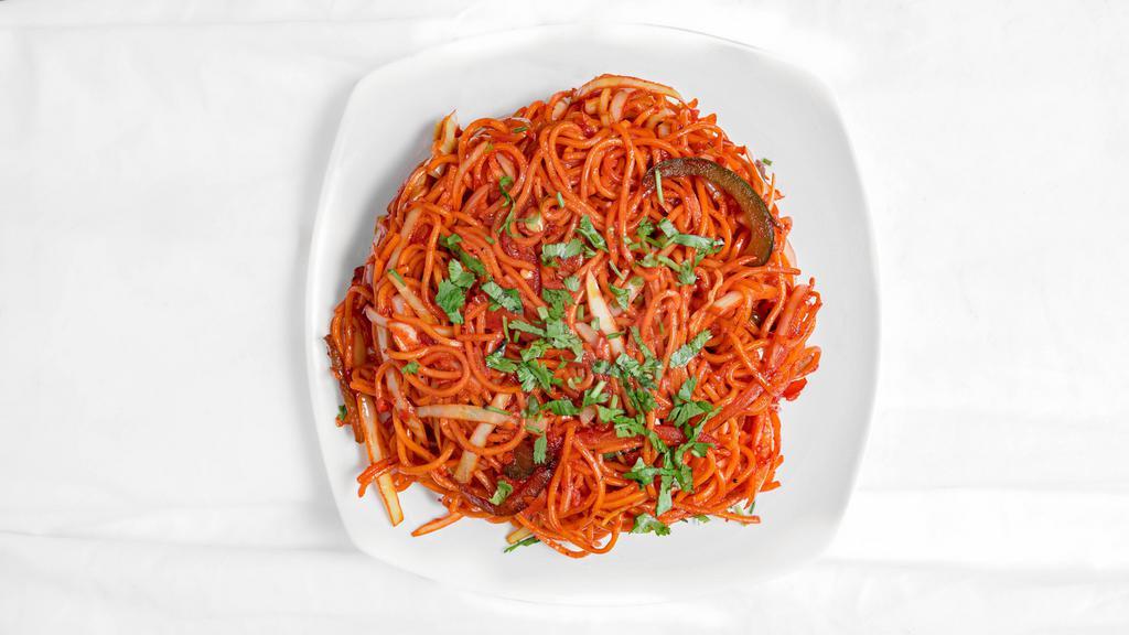Vegetable Schezwan Hakka Noodles · Stir-fried noodles, vegetables, and aromatics seasoned with a hot and spicy sauce bursting with ginger, garlic, and chili.