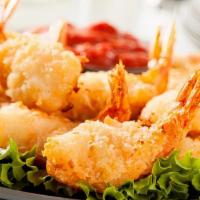 Fried Coconut Shrimp (8Pcs) · Jumbo shrimp coated with coconut flakes, lightly battered and served with coconut  sauce