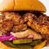 Jerk Chick Sandwich · Buttermilk-brined fried chicken breast, Jerk dust, spicy Caribbean slaw, pickles and Jerk ma...