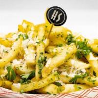 Parmesan Truffle Fries. · Skin-on, fried to a golden crisp and finished with shaved Parmigiano Reggiano, garlic, parsl...