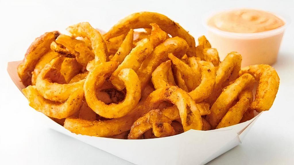 Curly Fries W/Chipotle Mayo · skin-on Kennebec potato, curled up, dusted with paprika and spices, and served with our smoky chipotle mayo.