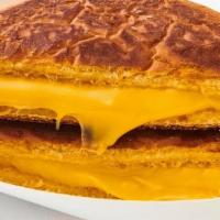 Kid’S Grilled Cheese · American cheese on a potato roll.