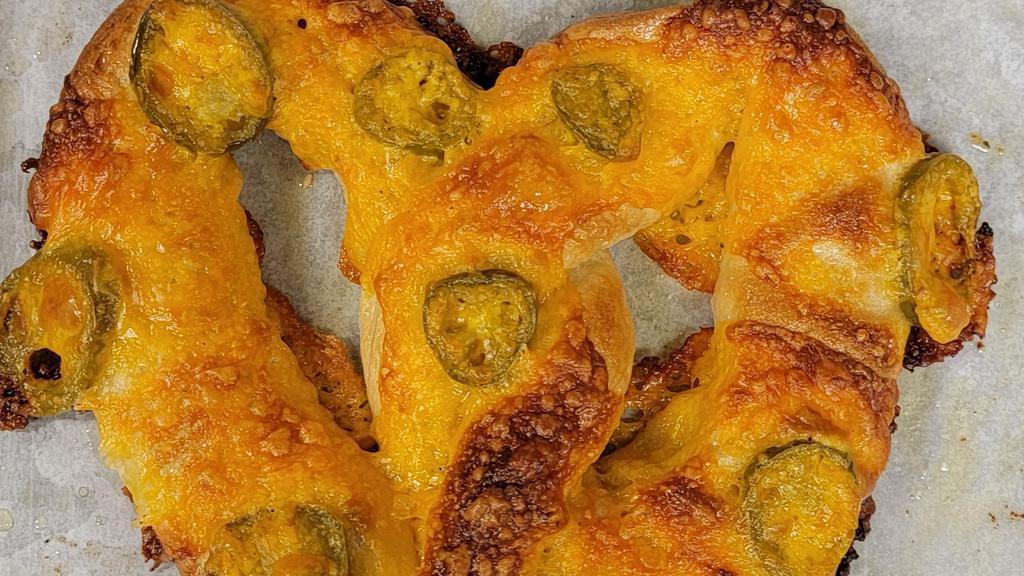 Jalapeno Cheddar Pretzel · Boars Head Cheddar Cheese melted over jalapenos, spreading jalapeno flavors all over this masterpiece of a pretzel