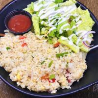 Vegetable Fried Rice · Pan-fried rice with scrambled egg and assorted vegetables.