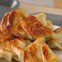 Pan Fried Or Steamed Pork Dumpling (8 Pieces) · 