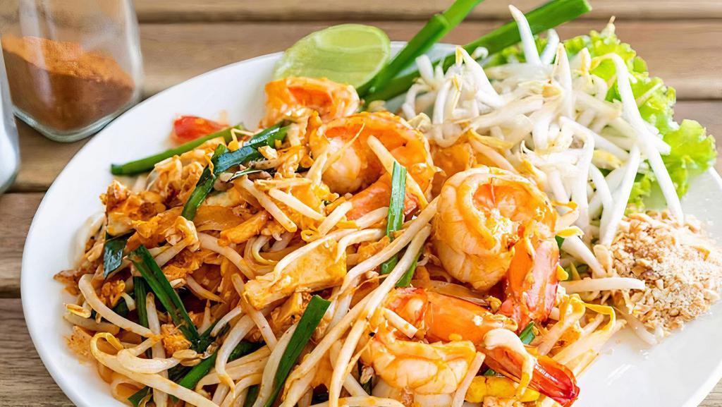 Pad Thai (Quart) · Thai rice noodle stir-fry with scrambled egg, bean sprouts, tofu, radishes in thai tamarind sauce, sweet, sour, and spicy, crushed peanut on the top.