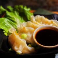 Vegetable Dumpling · Mixed vegetable wrapped in wonton skin serve with sweet soy sauce.