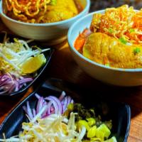 Khao Soy Gai · Hot. Slow cooked chicken leg in northern style curry with egg noodle, red onion, pickled mus...