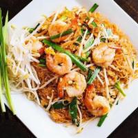 Pad Thai · Thin rice noodle, tofu, bean sprout, chives, peanut and egg.