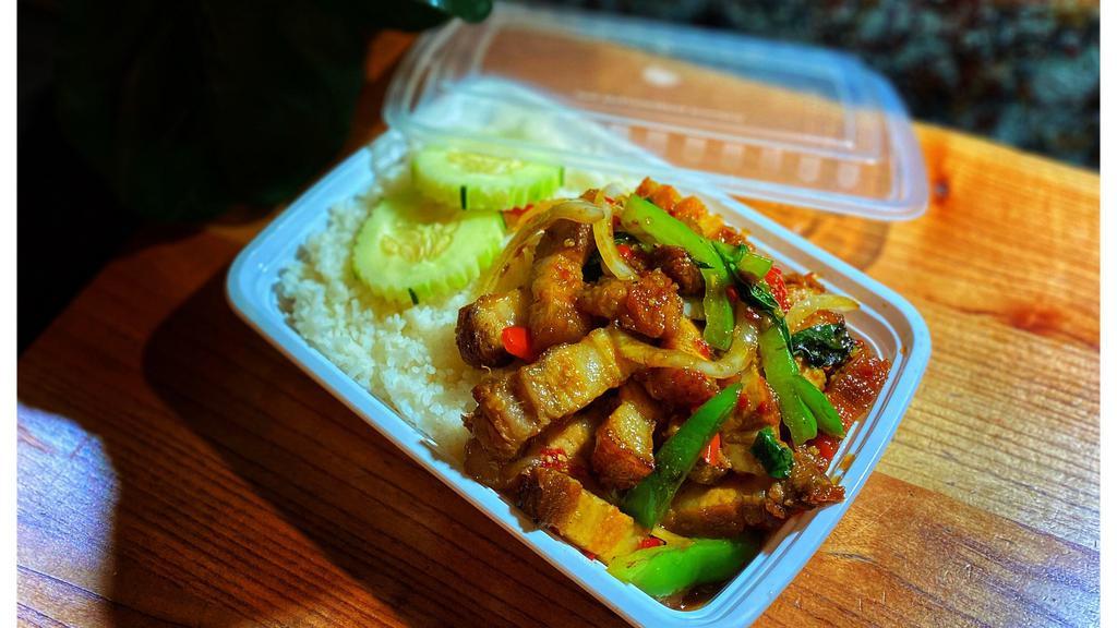 Gra Prow Moo Grob · Hot. Crispy pork belly with bell pepper, onion in spicy basil sauce. Very spicy.