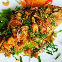 Pla Lui Suan · Hot. Choice of fish with red onion, mint, lemongrass, kaffia lime leaf, scallion, fresh chil...