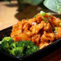 Chicken Volcano · Crispy chicken, cashew nut, pineapple in tamarind chili sauce served with steamed broccoli.
