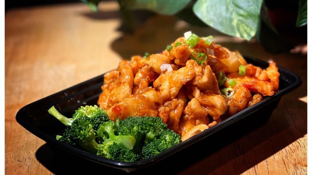 Chicken Volcano · Crispy chicken, cashew nut, pineapple in tamarind chili sauce served with steamed broccoli.