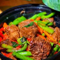 Stewed Beef Basil · Hot. Stewed beef sauteed with bell pepper, string bean, carrot and onion in basil sauce. Ver...