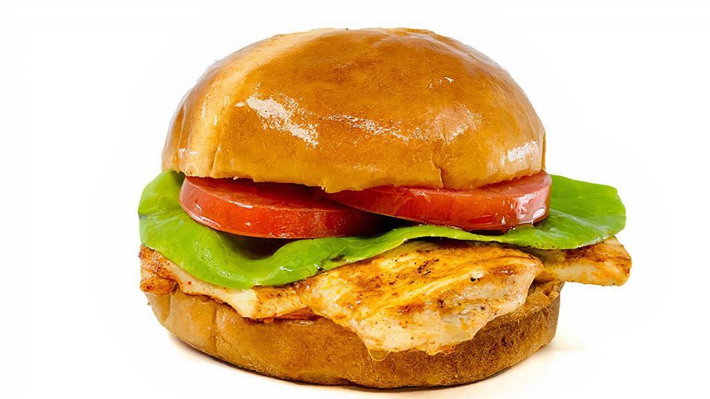 Grilled Sandwich · Char-grilled chicken breast with lettuce, tomatoes, onions, and mayo.