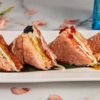 Pink Sandwich · Spicy tuna, avocado, crab egg, and lobster salad with tobiko on top. Spicy.