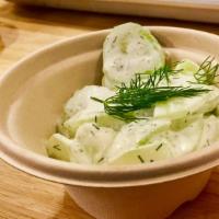Cucumber Salad · Tangy fresh cucumber, yogurt, and sour cream salad with lots of herbs. (Vegetarian)