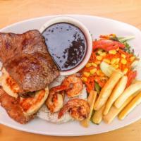 Parrillada · Grilled steak, chicken, pork loin and shrimp served with rice, beans yuca fries.
