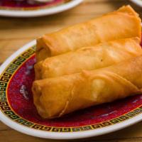 Crispy Vegetable Spring Rolls (V) · Mixed vegetables in thin flour wrappers. Vegan. (3 pieces).
