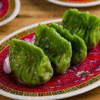 Boiled Edamame Dumplings (V) · Boiled edamame, mushrooms, and Chinese chives in spinach wrappers. Vegan. (4 pieces).