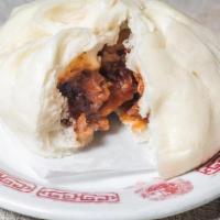 House Special Roast Pork Buns · Steamed wheat flour buns filled with pork and caramelized onions. (2 pieces)