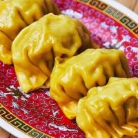 Boiled Chicken And Cabbage Dumplings · Boiled chicken and napa cabbage in wheat wrappers. (4 pieces)