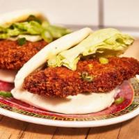 Crispy Chicken Buns · Steamed buns filled with panko crusted chicken, iceberg lettuce, scallion, and creamy sesame...