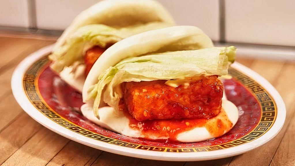 Sweet Chili Tofu Buns · Steamed buns filled with sweet chili glazed tofu, lettuce, and kewpie mayo (2 pieces).
