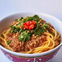 Sloppy Joe Noodles · Miso braised chicken, fried garlic, and chili. Served over egg noodles.