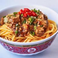 Szechuan Tofu Noodles (Vg) · Braised tofu, fried garlic, and chili. Served over egg noodles. (Vegetarian)