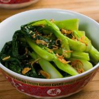 Chinese Greens · Steamed Chinese broccoli dressed with oyster sauce, sesame oil, fried shallots, and sesame s...