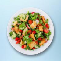 Og Fattoush Salad · Fresh Lettuce, tomatoes, onion, cucumber, mint, parsley, green pepper, and garlic tossed wit...