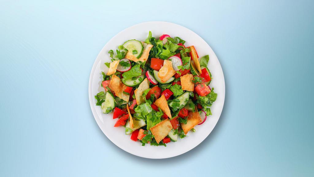 Og Fattoush Salad · Fresh Lettuce, tomatoes, onion, cucumber, mint, parsley, green pepper, and garlic tossed with bits of toasted pita bread, balsamic vinaigrette, and olive oil.