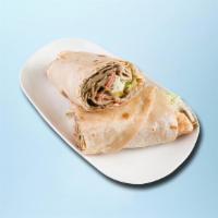 Monster Beef Shawarma Wrap · Roasted beef stuffed in the house-made hummus, smothered wrap topped with diced tomatoes, cu...