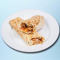 Chicken Kabob Shawarma Wrap · Chicken kabob skewers, tomatoes, pickles, onion, and tahini dressing wrapped in large shark ...