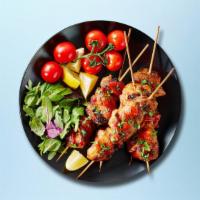Chusky Chicken Kabob Plate · Chicken kabobs marinated served with house rice, steamed fresh mixed vegetables and salad