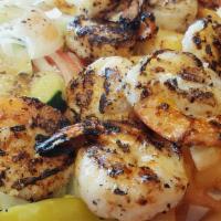 Shrimp Kabob · Charcoal grilled marinated shrimp. garlic sauce for dipping.