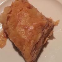 Baklava · Filo dough pastry stuffed with walnuts and draped in honey.